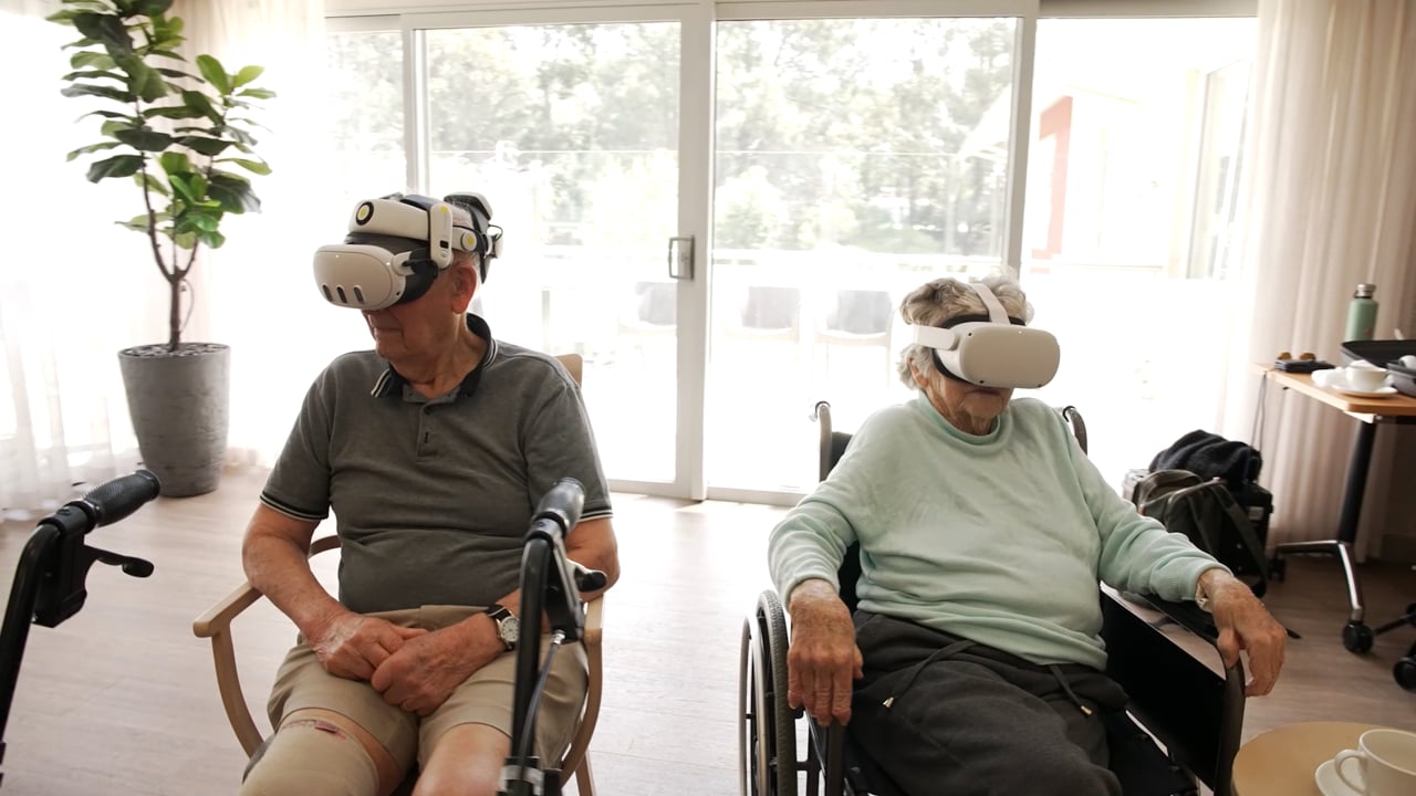 Two residents wearing VR headsets during a Periscope Pictures session in Perth