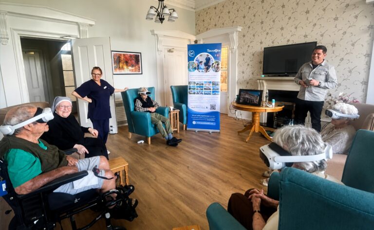Residents of a care home taking part in a group VR session